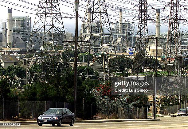 Utility workers power lines repair trucks responding to reported incident in Redondo, Ontario