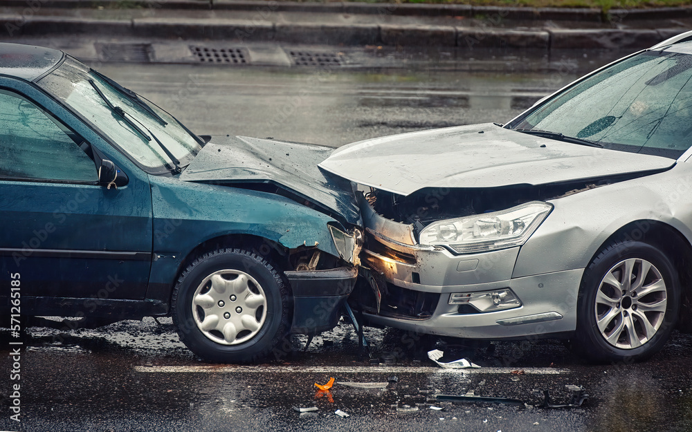 Crashed vehicles ambulances police roadblocks responding to reported incident in Sannier, Rhode Island